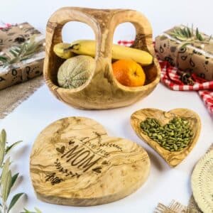 Wooden Serving Utensils; a wooden fruit basket with handle, a heart-shaped Cutting board and a heart-shaped serving dish