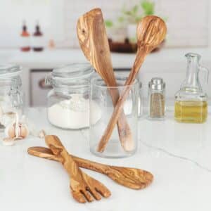 Wood Utensils for Cooking: a large wooden cooking spoon, a corner spoon, a wooden handle spatula and a wood fork