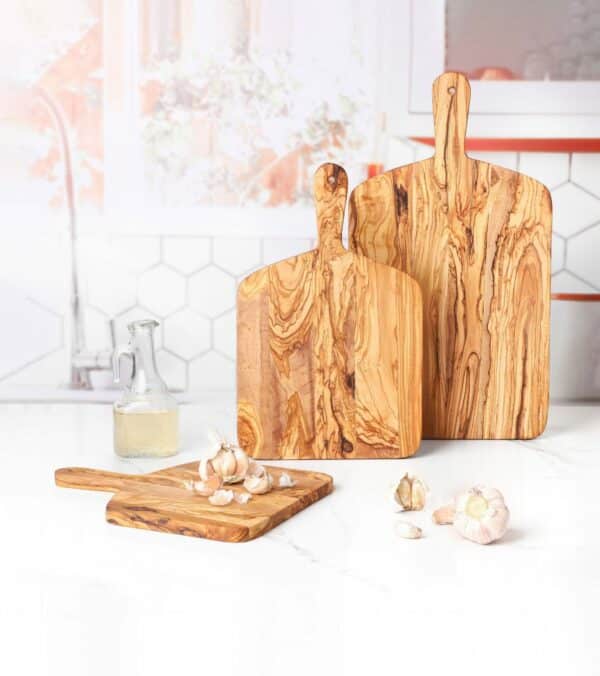 Set of 3 Olive Wood Cutting Boards with Handles. Each cutting board is different in size.
