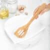 Slotted Wooden Spoon with three gaps.